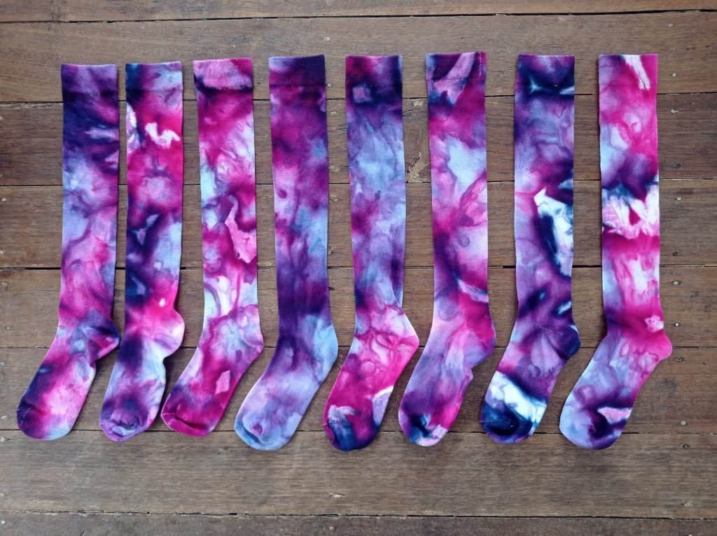 Ice-dyed socks - pink and purple knee-high ice-dyed socks.